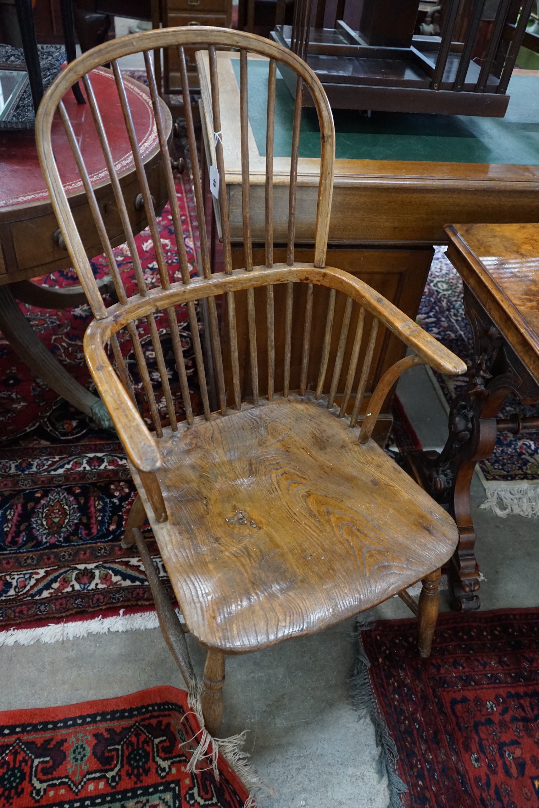 A 19th century ash and elm Windsor comb back armchair, width 54cm, depth 50cm, height 105cm